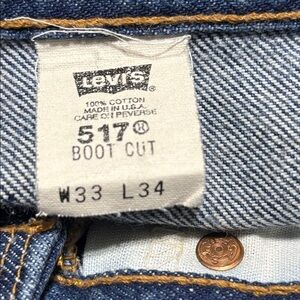 VTG Levi’s 517 Bootcut Jeans Made in USA 33x34 Red Tab Distressed Hem